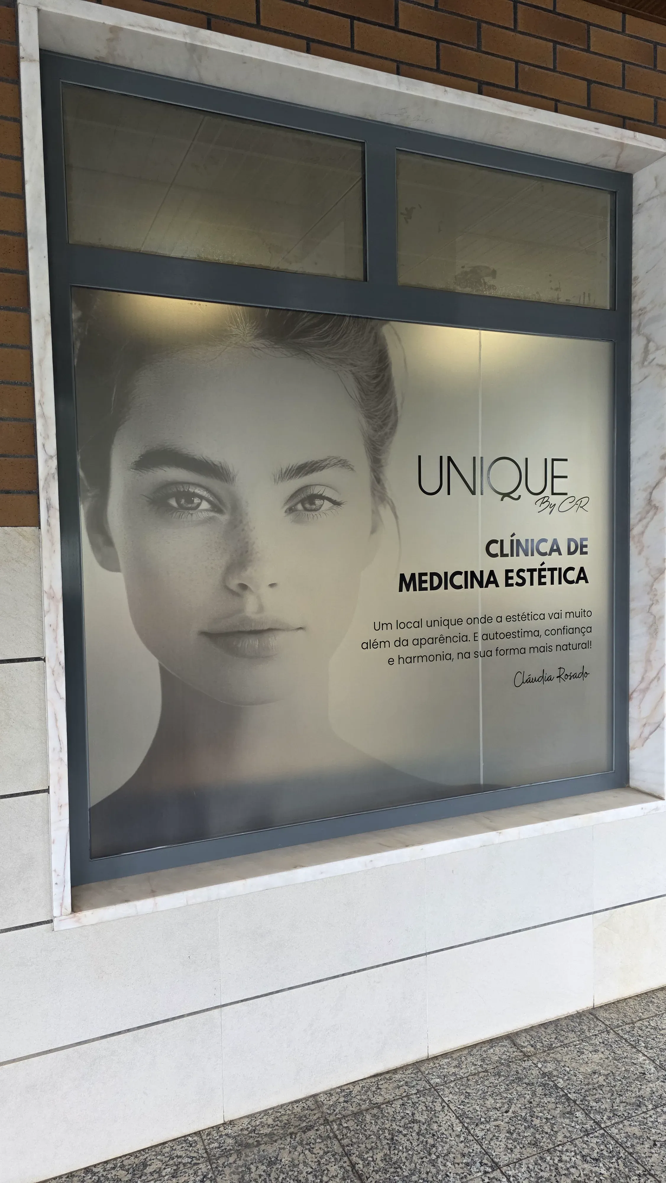 ramada storefront window sign